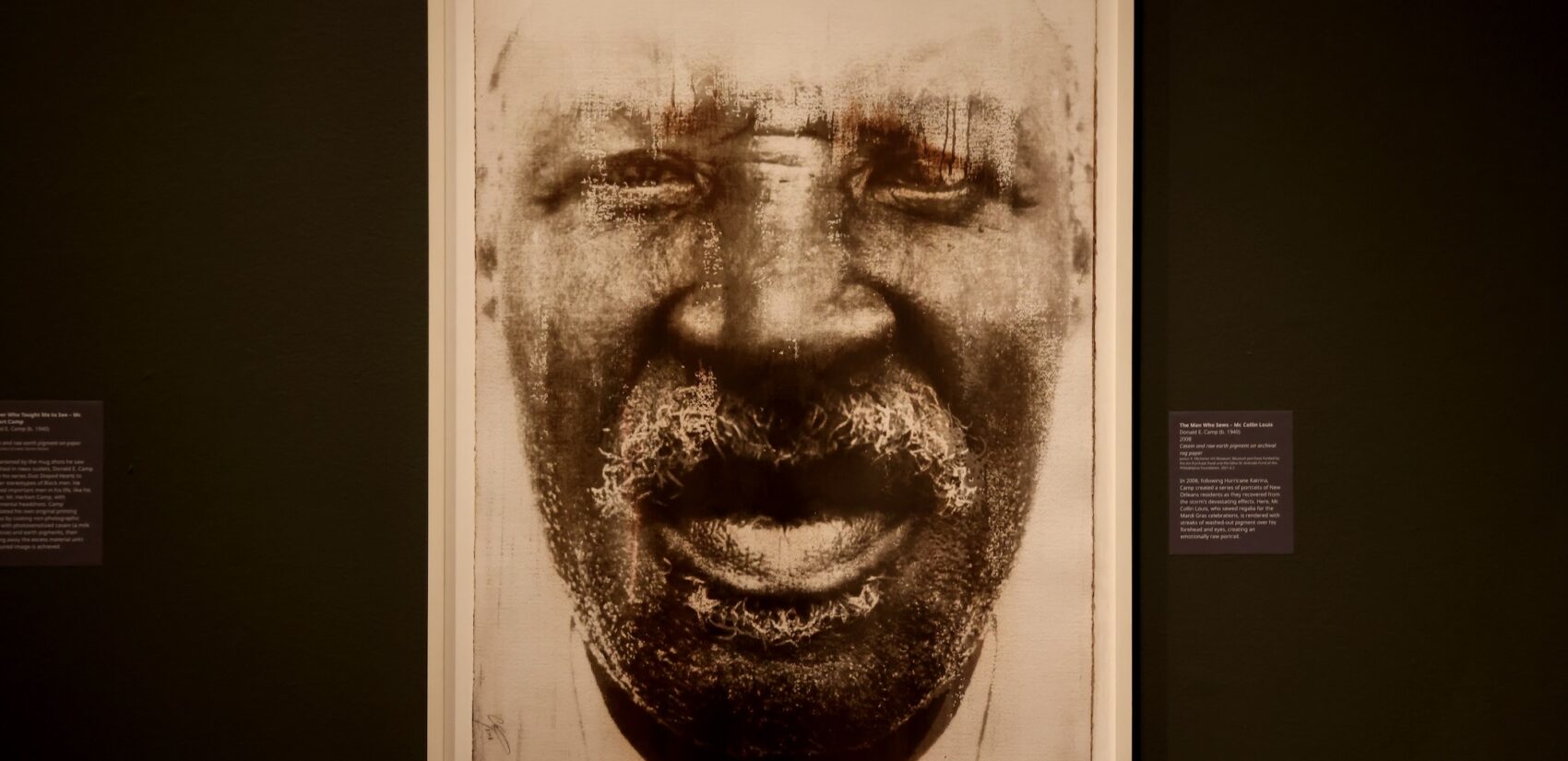 a piece of art hanging up in the exhibit