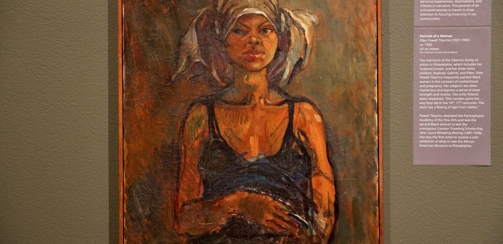 a piece of art hanging up in the Lewis Tanner Moore exhibit