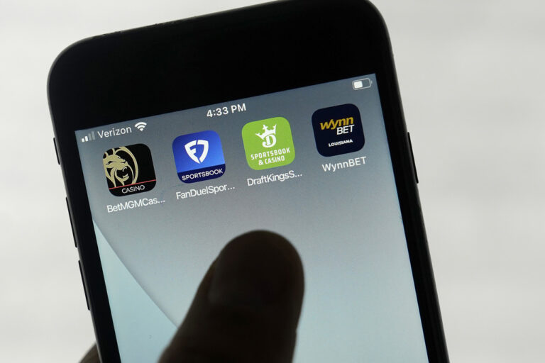 FILE - FanDuel, DraftKings and other online gambling apps are displayed on a phone in San Francisco, Sept. 26, 2022.   (AP Photo/Jeff Chiu, File)
