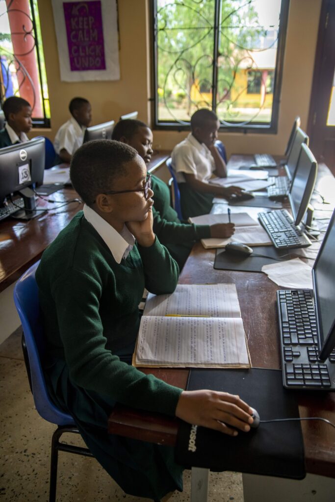 Students working on computers in a classroom