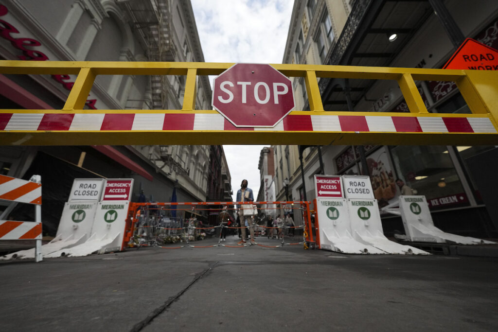 New Orleans Super Bowl Security Newly installed security barriers are seen on Bourbon Street next to a memorial for victims of the Jan. 1 car attack ahead of the Super Bowl in New Orleans, Friday, Jan. 31, 2025. (AP Photo/Gerald Herbert)