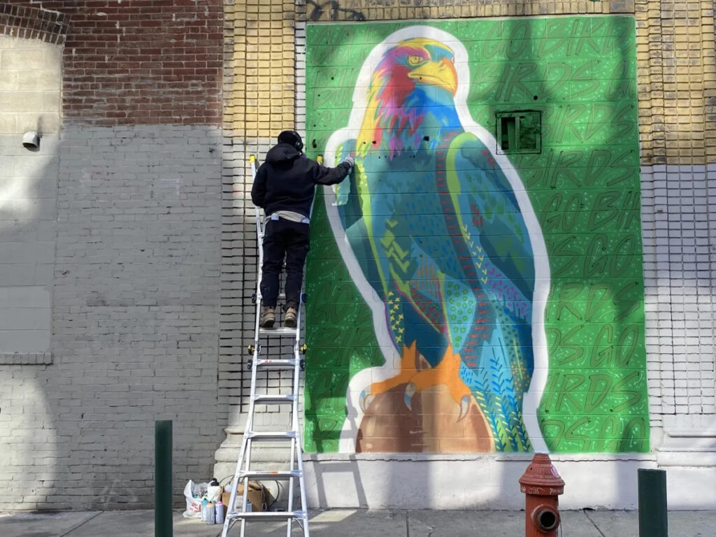 Philadelphia-themed-mural-Broad-Alter-streets-2025 a mural of a colorful Eagle