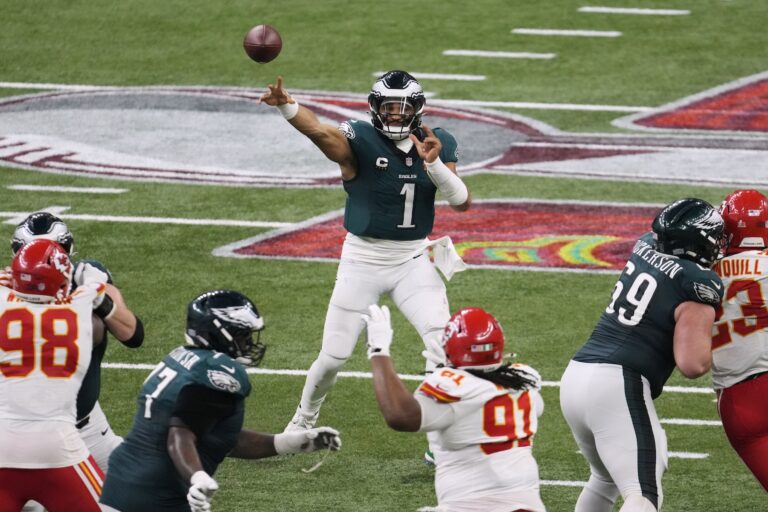 Jalen Hurts throwing the ball during the game