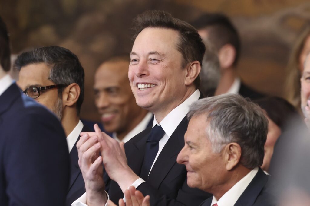 Trump Inauguration Elon Musk smiling and clapping