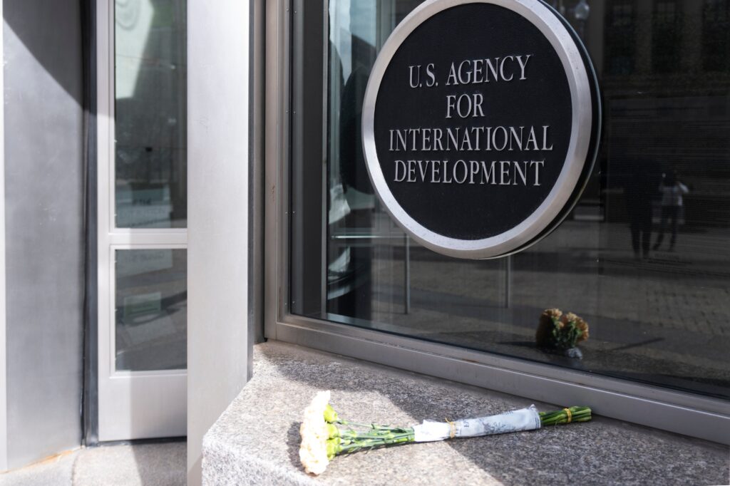 US-Agency-for-International-Development-2025-02-07 A bouquet of white flowers placed outside the headquarters of the United States Agency for International Development