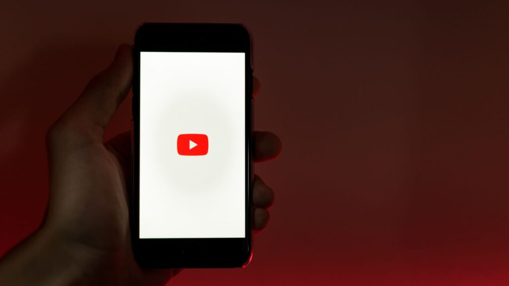 YouTube on a smartphone The global media streaming service turns 20 in 2025.