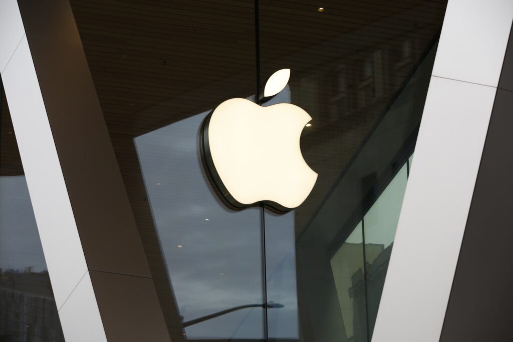 The Apple logo on the front of an Apple Store