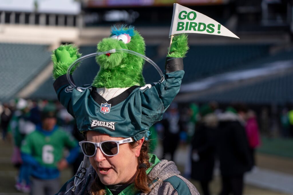 eagles-fan-2025-02-02 an Eagles fan with a Phillie Phanatic hat