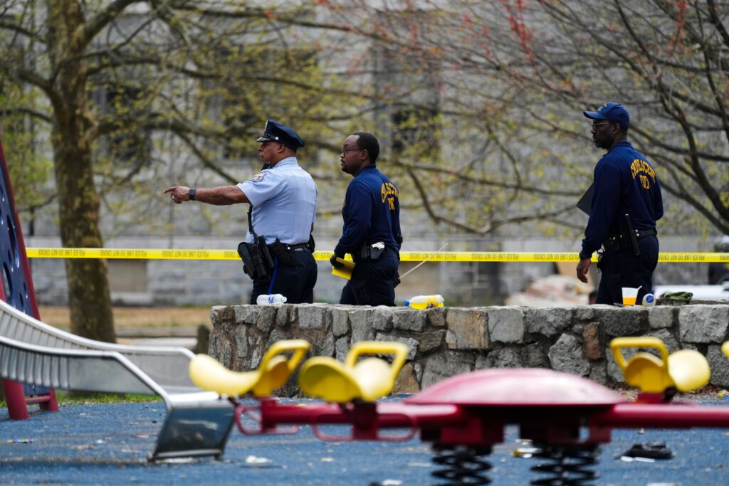eid-al-fitr-shooting-west-philadelphia-officers-2024-04-10 Investigators walking through the scene