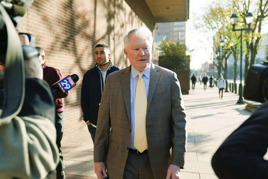 John Dougherty walks to the federal courthouse