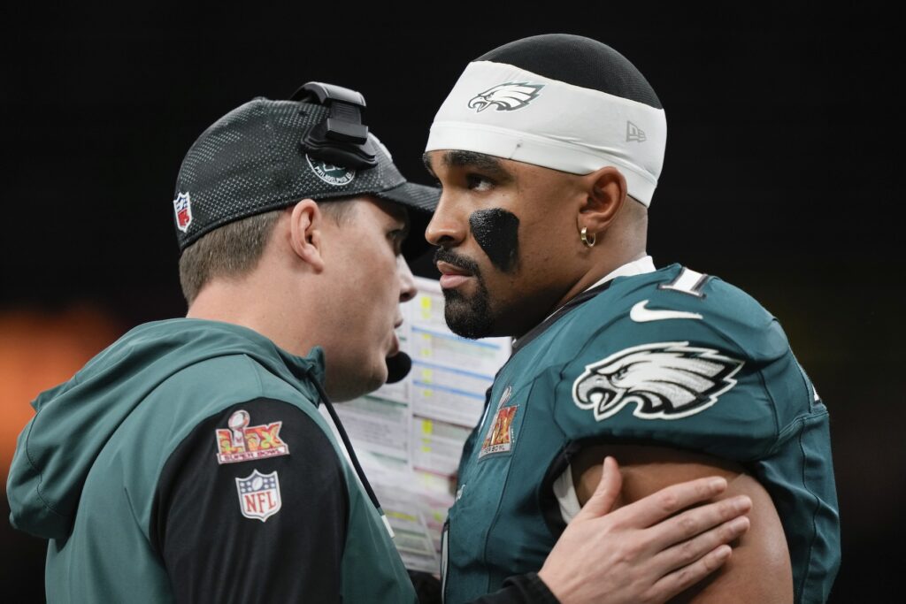 Jalen Hurts,Kellen Moore Philadelphia Eagles quarterback Jalen Hurts (1) talks to offensive coordinator Kellen Moore