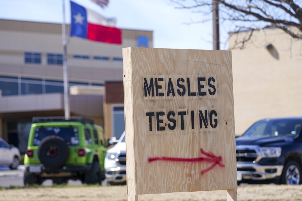 Measles-Explainer Sign offering measles testing