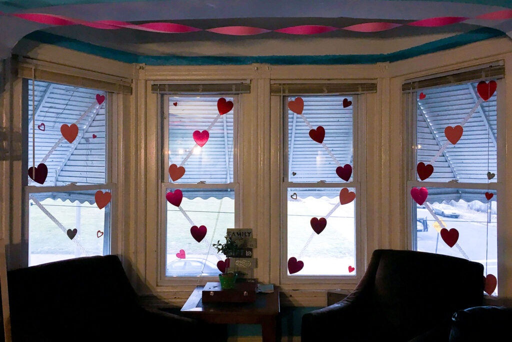 morrishouse-valentinesday-2 Valentine's Day decorations hanging up on windows