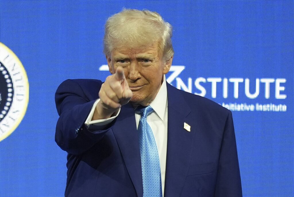 APTOPIX Trump President Donald Trump arrives to speak at the Future Investment Initiative (FII) Institute summit in Miami Beach, Fla., Wednesday, Feb. 19, 2025.