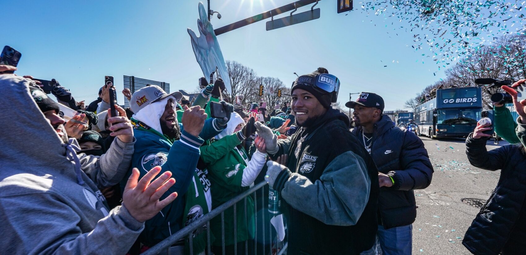 Saquon Barkley greets fans on South Broad Street during the Philadelphia Eagles Super Bowl LIX victory parade