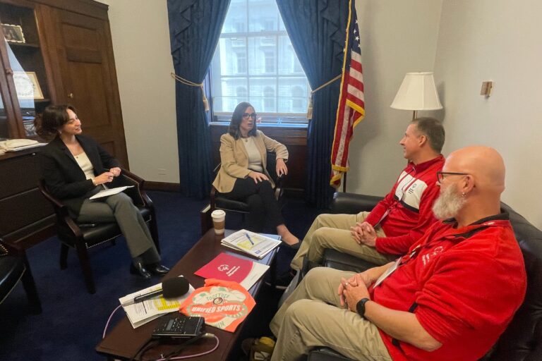 McBride speaking with Hatti Specter, David Halley and Tommy Fields