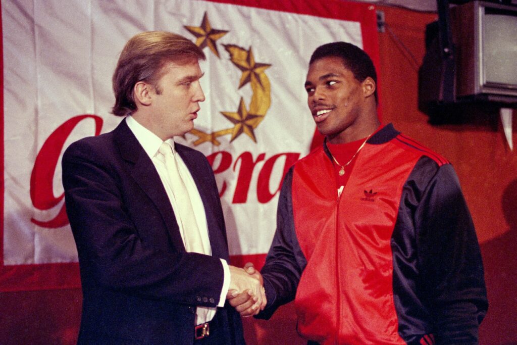 Trump Superbowl Donald Trump shakes hands with Herschel Walker