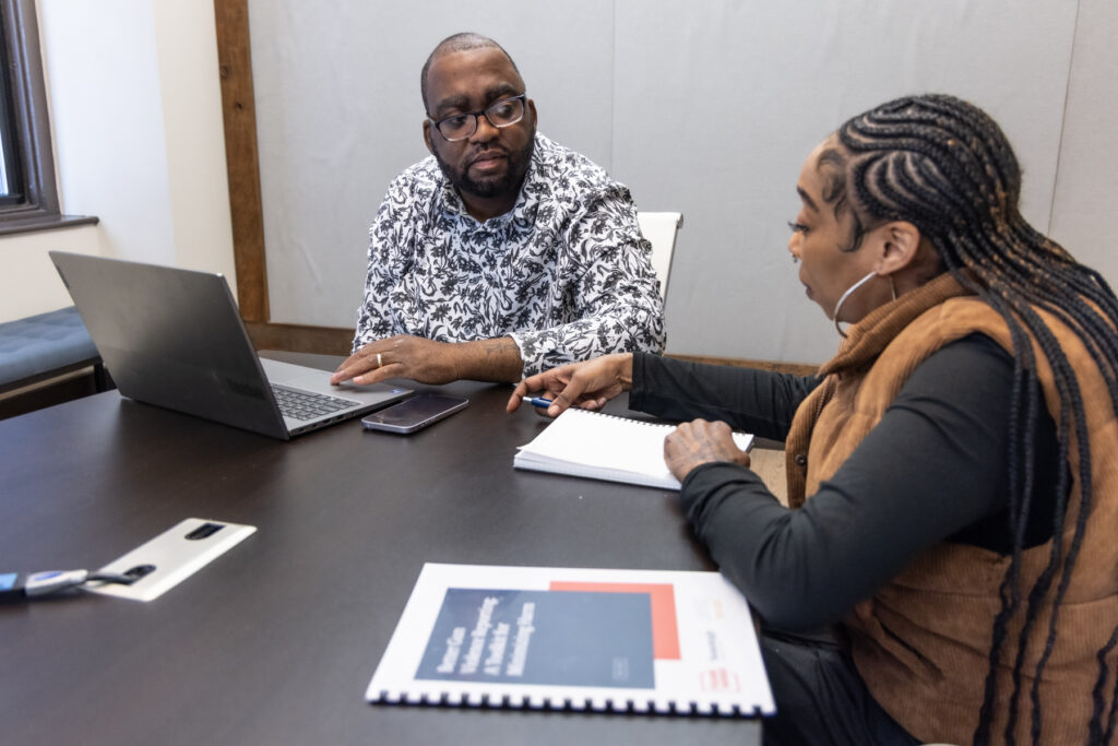 Oronde McClain and Qayona Williams speak to each other