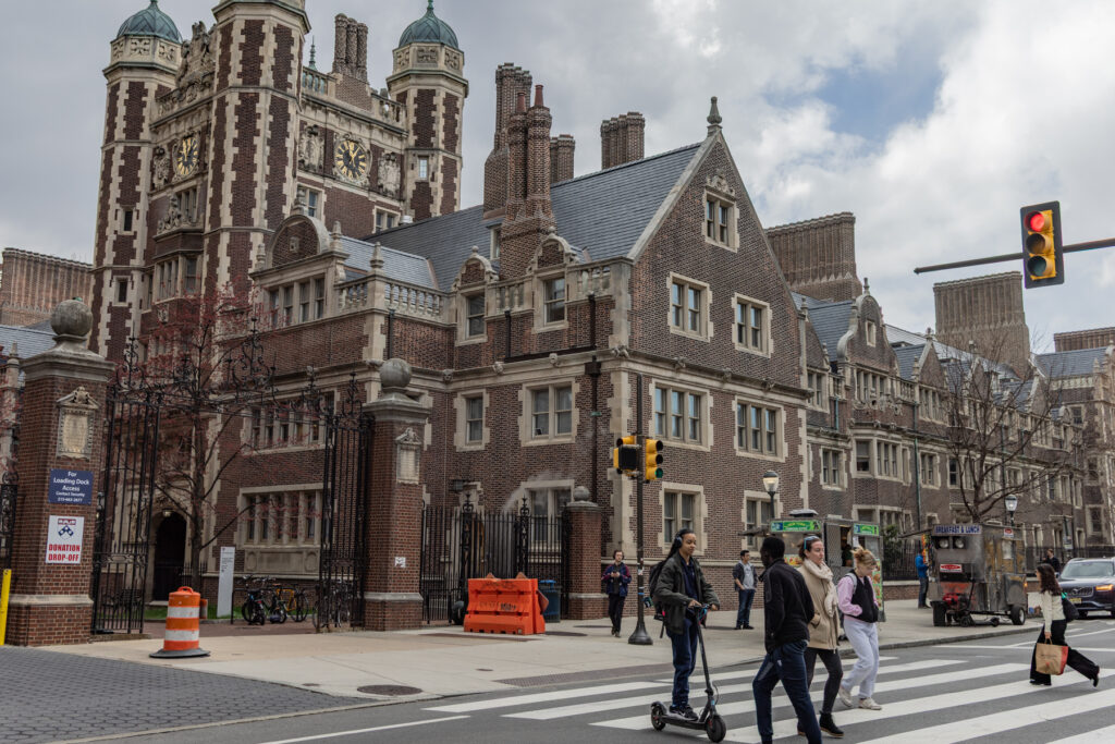 UPenn’s campus in Philadelphia. (Kimberly Paynter/WHYY) Students walking on Penn's campus