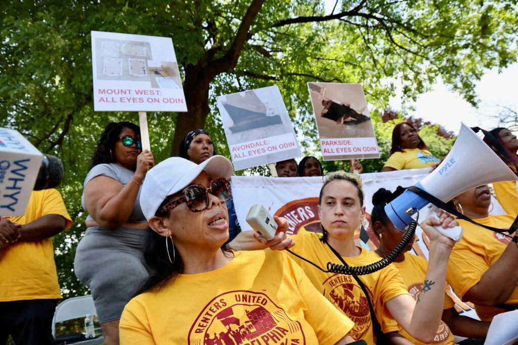 Lori Peterson speaks to protesters