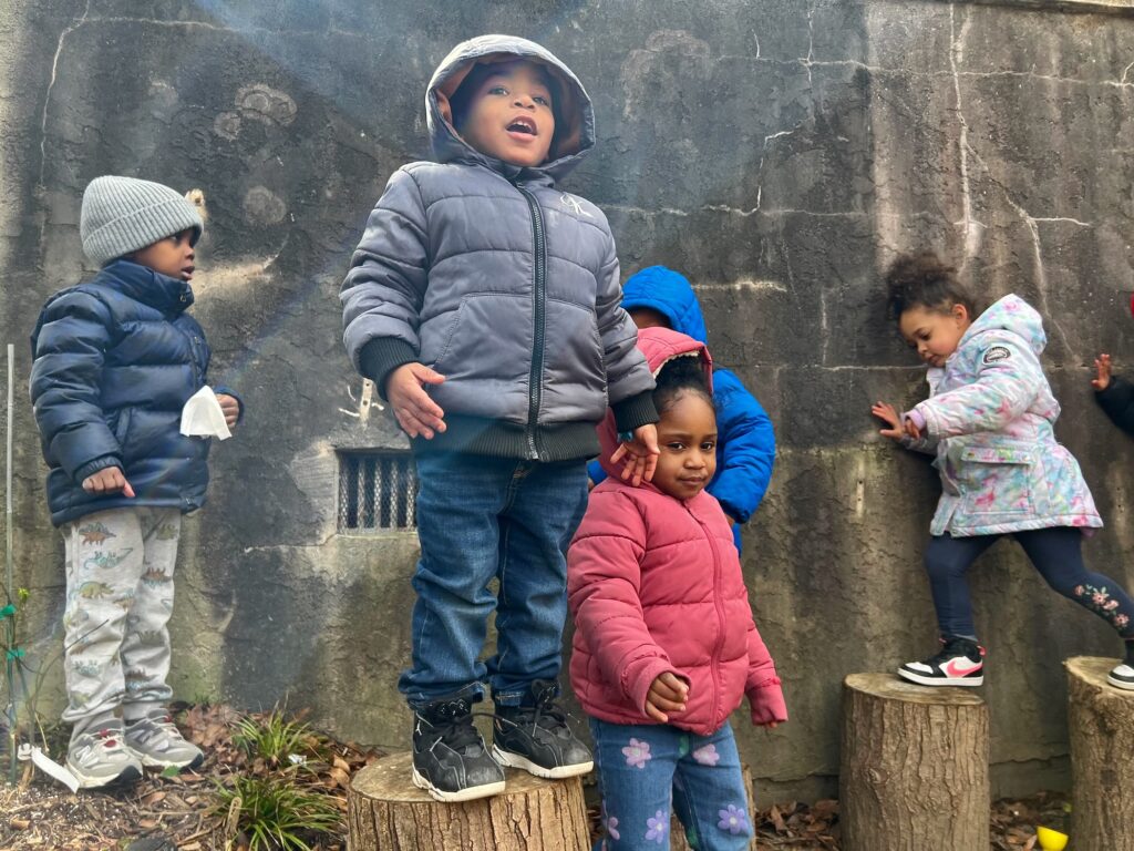 Children play in the Secret Garden