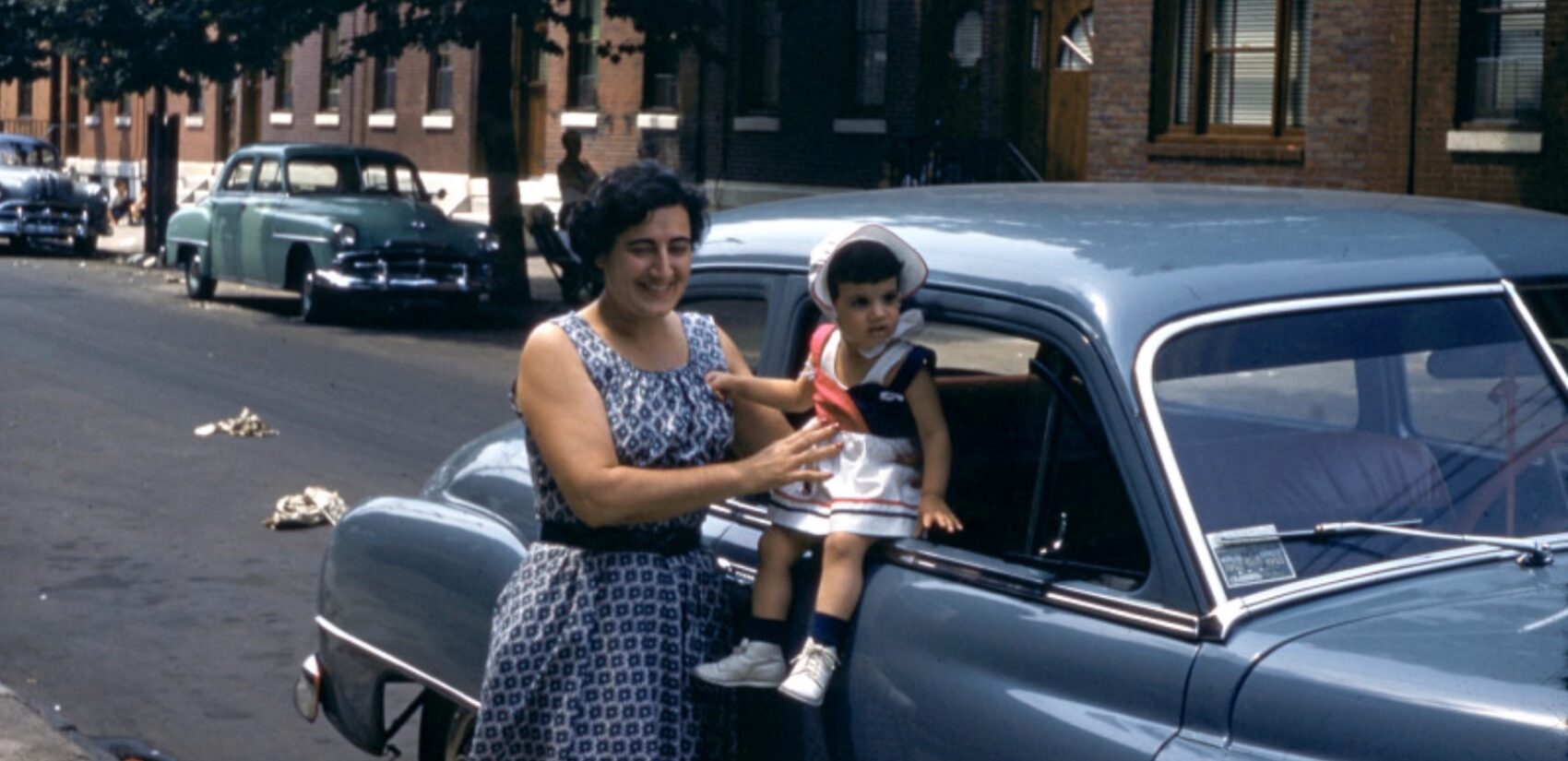a photo of Daria DiPasquale's aunt and cousin by a car