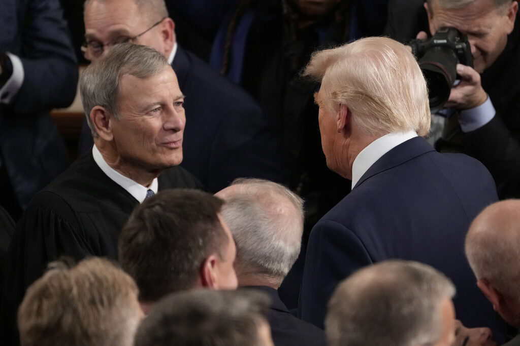 Trump Speech President Donald Trump greets Chief Justice of the United States John Roberts before he addresses a joint session of Congress in the House chamber at the U.S. Capitol in Washington, Tuesday, March 4, 2025. (AP Photo/Julia Demaree Nikhinson)