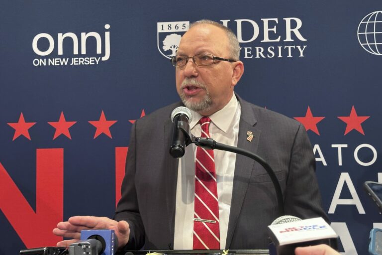 Ed Durr speaking at a microphone