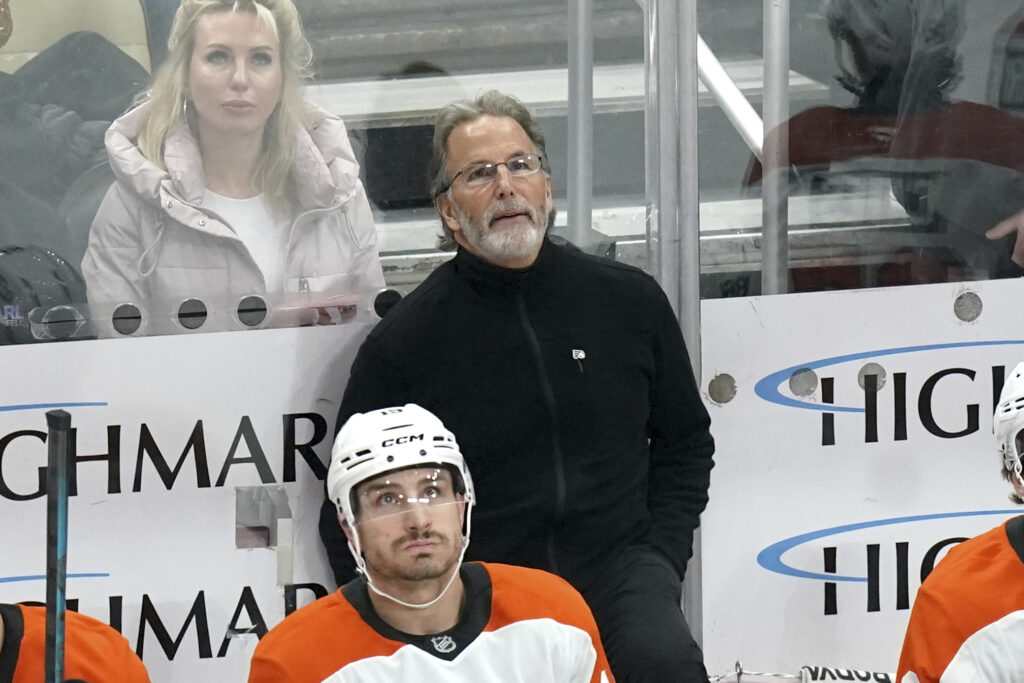 Flyers Penguins Hockey John Tortorella stands behind his bench