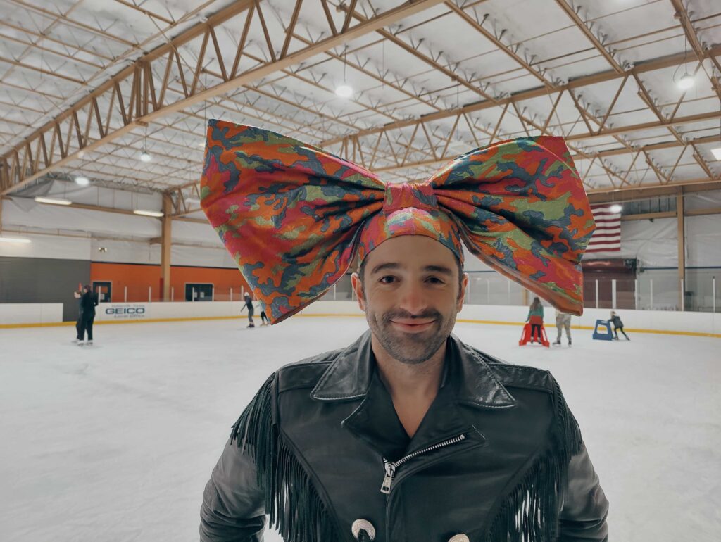 bearded-ladies-cabaret-ice-skating-2025-4 John Jarboe smiles
