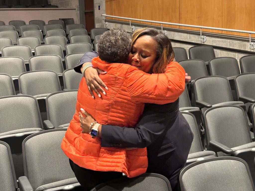 katrina-mccombs-hug-kb-032525 Superintendent Katrina McCombs hugs her mom
