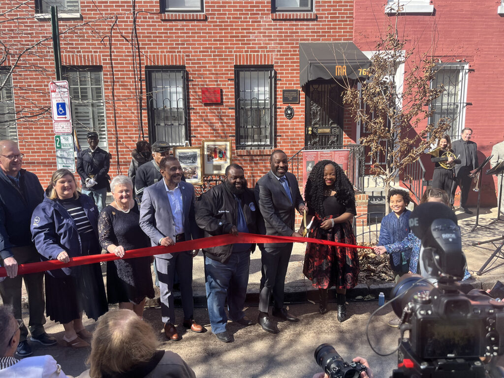 marian_anderson_museum_6 Several dignitaries cut a red ribbon outside the The Marian Anderson Historical Society & Museum in South Philadelphia