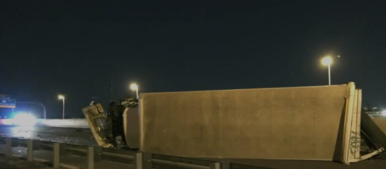 An overturned tractor trailer sits on I-76 after a crash on March 8, 2025.