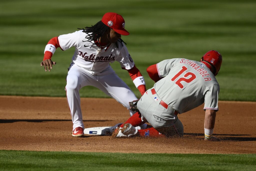 Phillies Nationals Baseball Philadelphia Phillies' Kyle Schwarber (12) is out