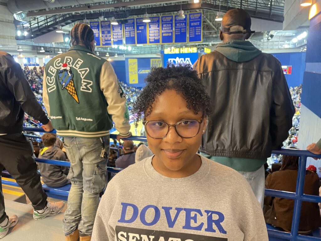 Layla Robinson posing for a photo at the basketball game