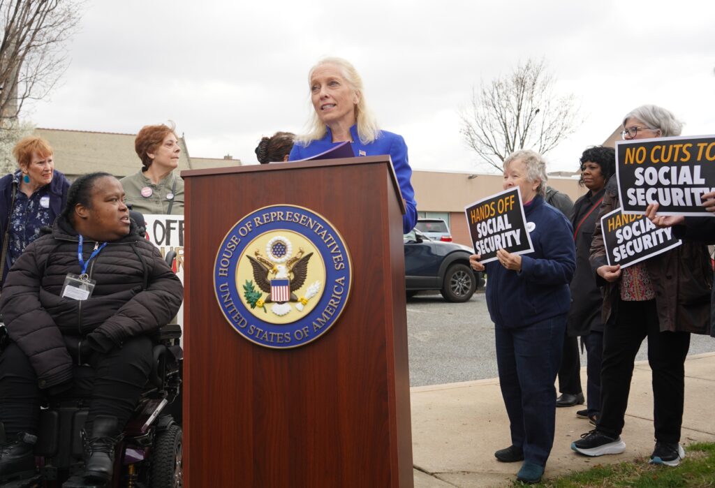 social-security-cuts-speech-scanlon-chester-2025-03-31-7 Mary Gay Scanlon speaks behind a podium