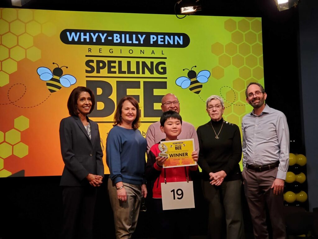 spelling-bee-2025-WHYY-Billy-Penn Philly regional spelling bee winner Jayden Jiang shows off his win