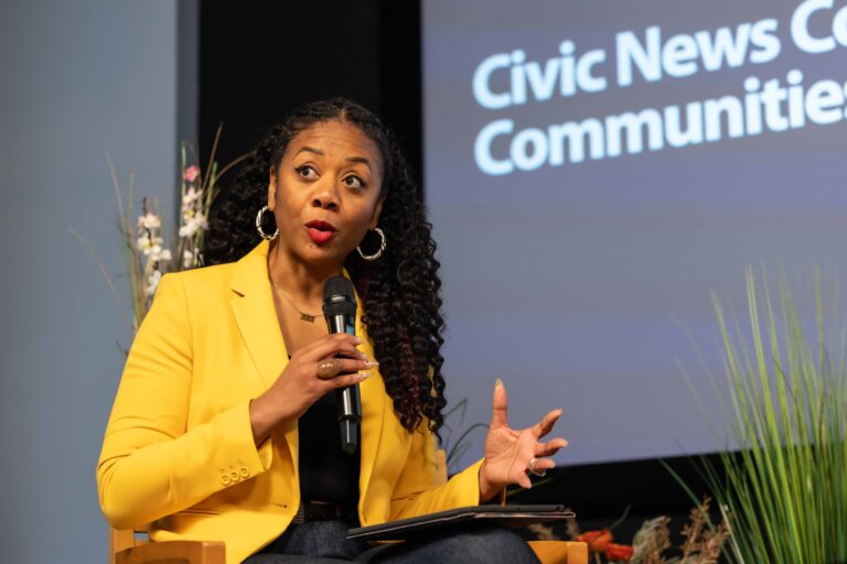 Cherri Gregg asks the panelists a question