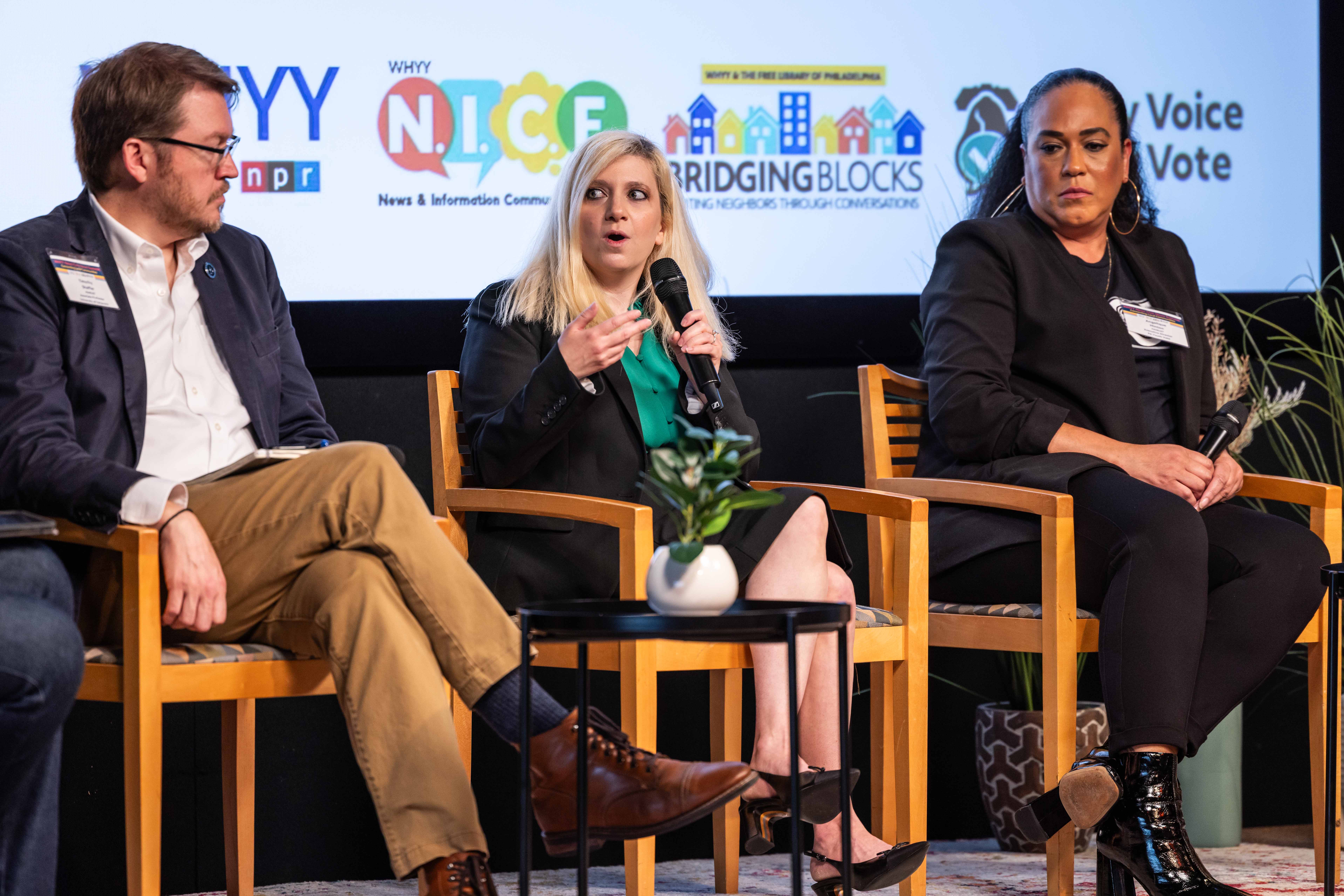 Julie Silverbrook speaking on stage during a panel discussion
