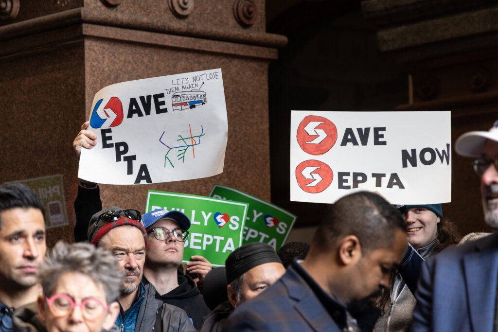 04-11-2025-SEPTA-rally-Philadelphia-6 two signs among others read SAVE SEPTA and SAVE SEPTA NOW