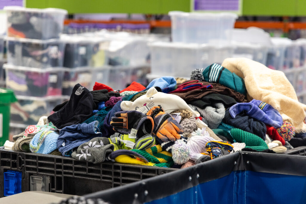 Bins filled with donated items for kids