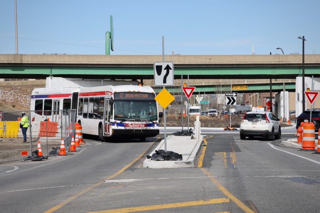 2025 02 18-e lee-philadelphia penrose roundabout-traffic calming articulated bus a bus on the roundabout