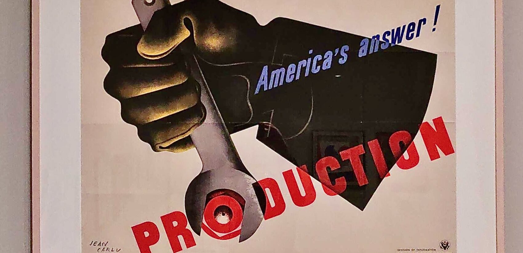 a propaganda poster says America's answer! PRODUCTION