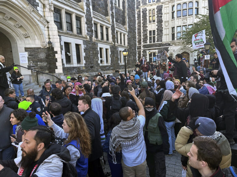 Students at the City College of New York protest the Israel-Hamas war on the campus in the Harlem neighborhood of New York, Thursday, April 25, 2024. (AP Photo/Jake Offenhartz)