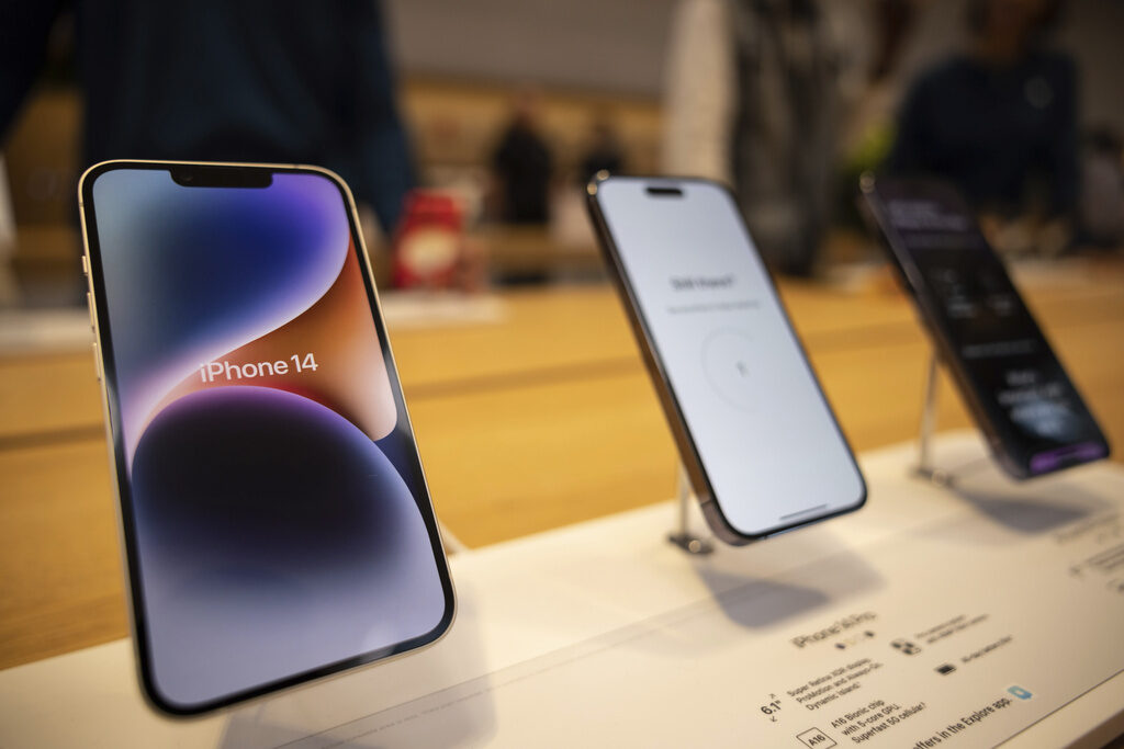 Trump-Tariffs-Electronics iPhones sit on display at a store