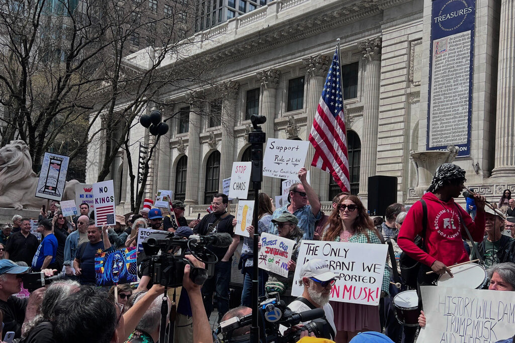 Trump Protest People gather to protest President Donald Trump's policies on Saturday, April 19, 2025 in New York.