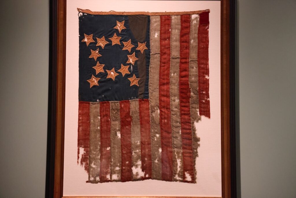 2024 04 17-e lee-philadelphia museum of the american revolution-banners of liberty stars and stripes Early version of the Flag of the United States of America on display at the Museum of The American Revolution