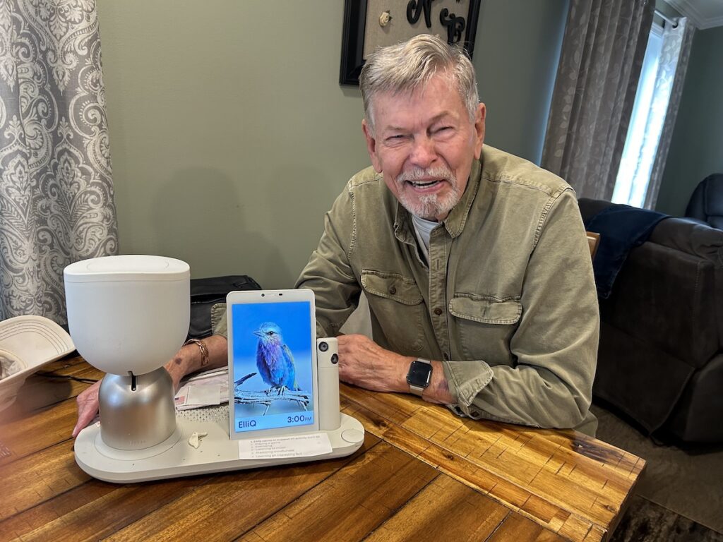 Anthony Niemiec with ElliQ, an AI companion robot, in Beacon, New York. (Dawn Attride/For WHYY) Anthony Niemiec with ElliQ, an AI companion robot, in Beacon, New York. (Dawn Attride/For WHYY)