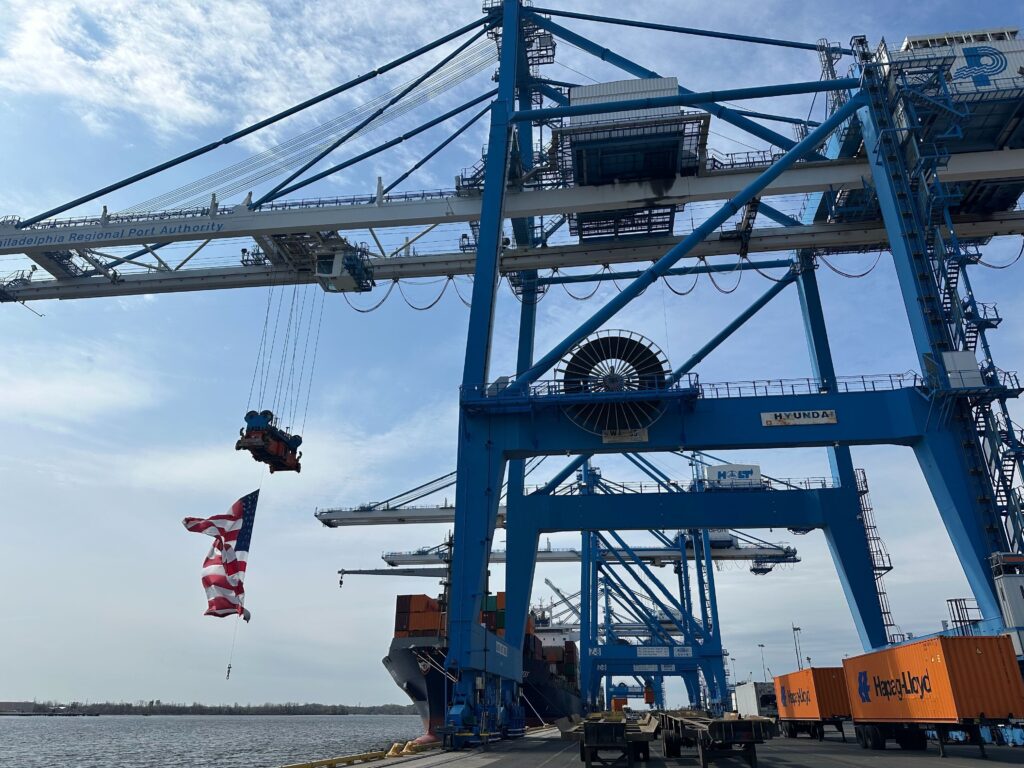 A container vessel being unloaded