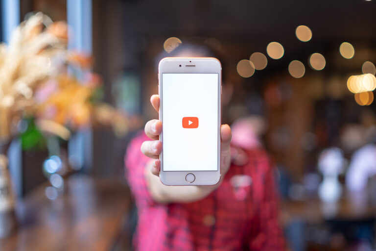 CHIANG MAI, THAILAND - Apr.08,2019: Woman holding Apple iPhone 6S Rose Gold with Youtube apps on screen. YouTube is the popular online video sharing website.